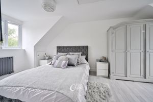 Bedroom One- click for photo gallery